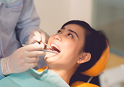 dentist operating on women