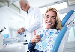 Smiling woman visiting cosmetic dentist in Green Hills
