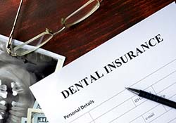 Dental insurance form resting on a table