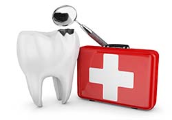 Diagram of a damaged tooth next to a first-aid kit