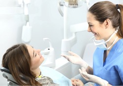 A female patient and her dentist