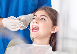 Women receiving dental checkup