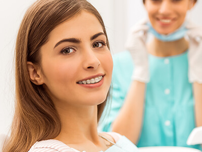 girl smiling with retainer