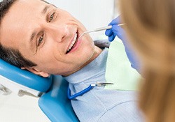 Smiling man in dentist’s chair