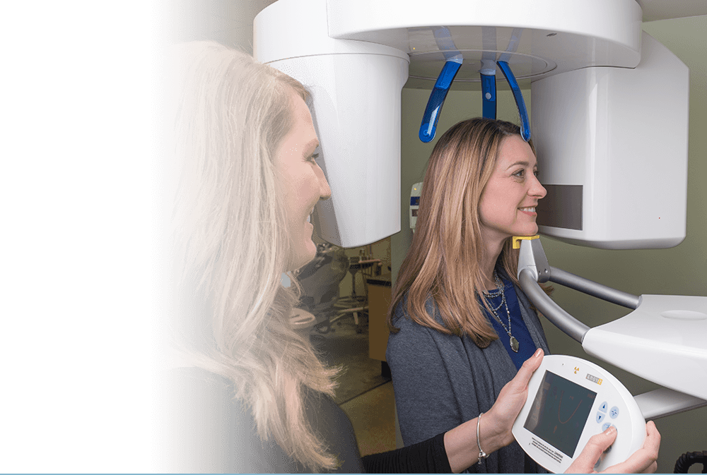 Woman getting dental x rays taken