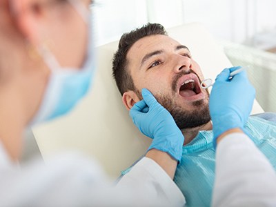 A man getting a dental exam