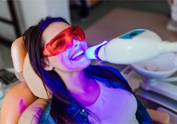 a patient undergoing teeth whitening in Green Hills