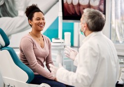 a patient discussing cost of teeth whitening in Green Hills