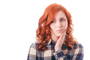 Young woman with toothache