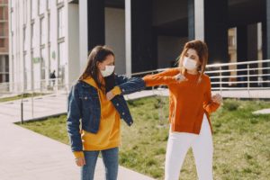 Young women leaving dentist in Green Hills.