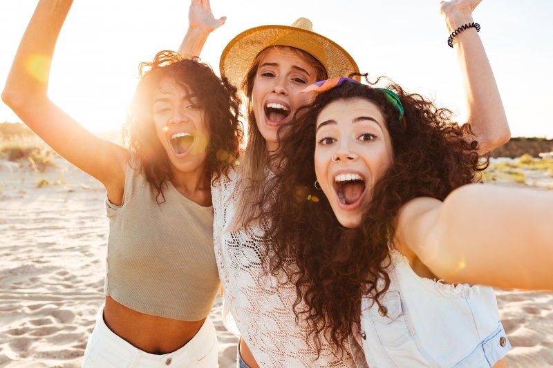 friends smiling during summer vacation