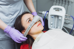 Young woman getting ready for sedation dentistry